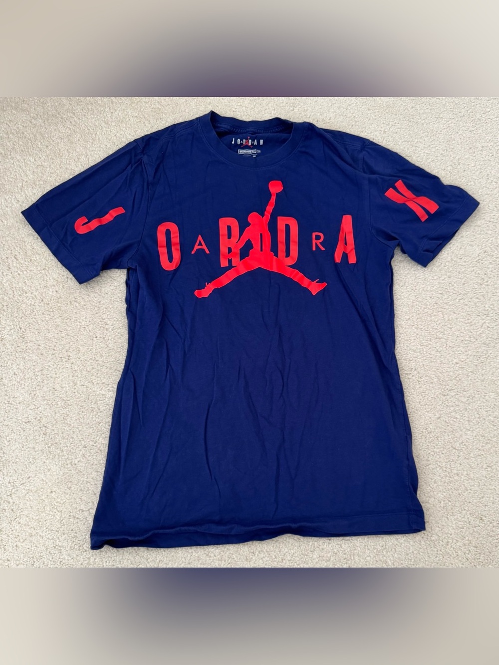 Jordan Men’s Navy Blue Tee with Red Jumpman Graphic